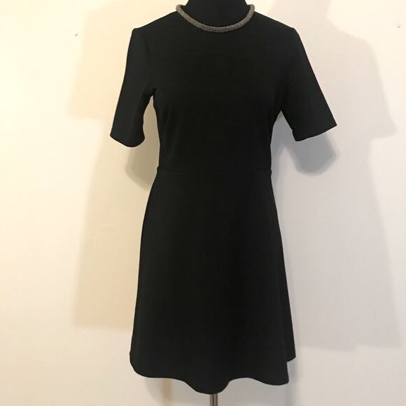 Topshop Dresses & Skirts - Topshop blk skater dress with beaded collar SZ 6